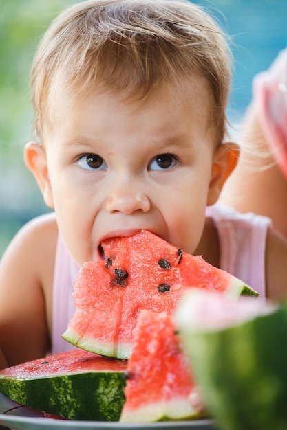 Child eating watermelon