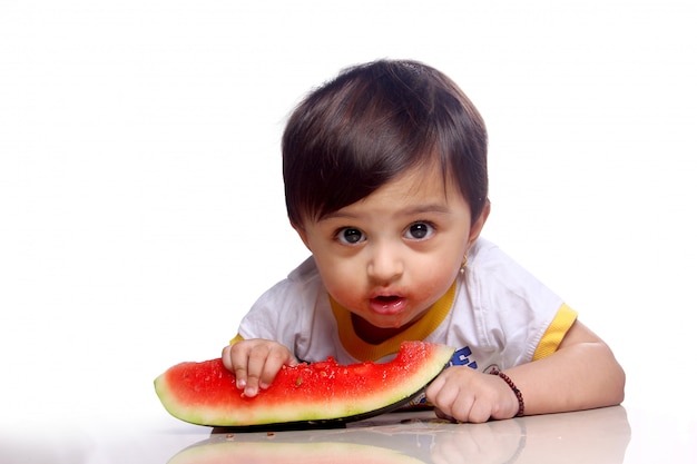 Child eating watermelon