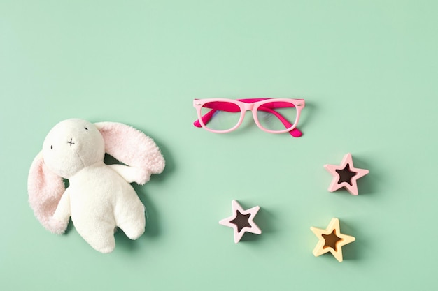 Photo child eyeglasses over pastel background optical store glasses selection for kids