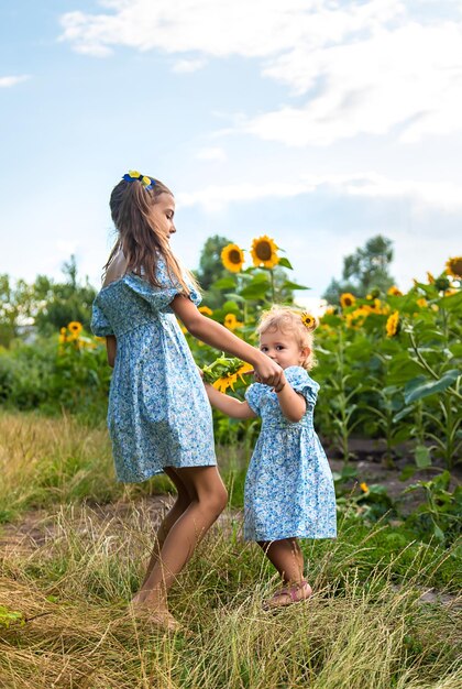 A child in a field of sunflowers Ukraine Selective focus