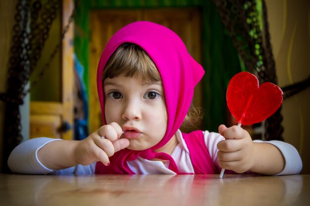 Child and food. Selective focus.