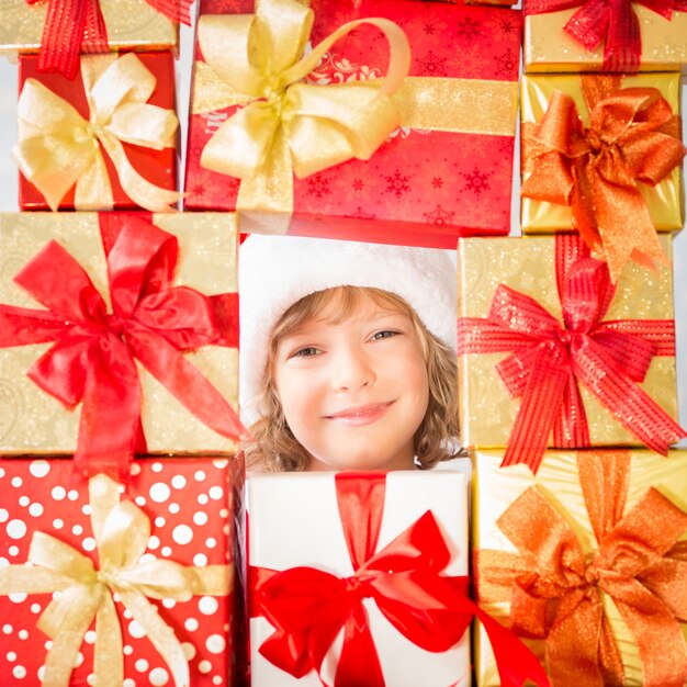 Child framed Christmas gift boxes. Xmas holiday concept