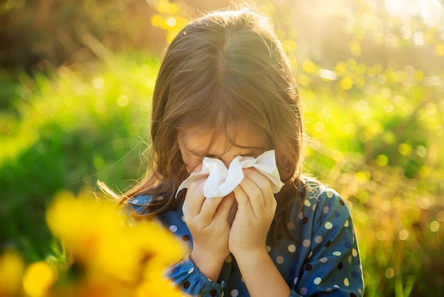 Child girl allergic to flowers Selective focus