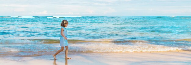 Child girl on the beach in Sri Lanka