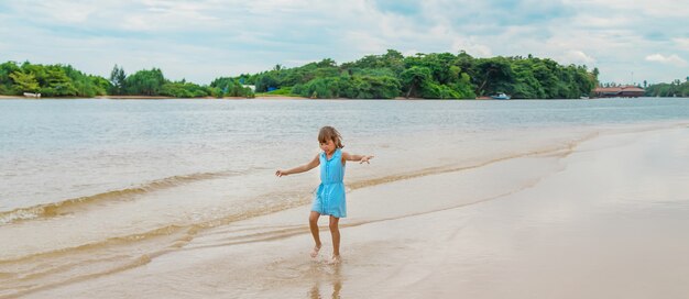 Child girl on the beach in Sri Lanka