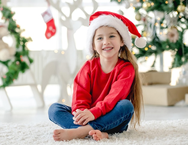 Child girl in Christmas time