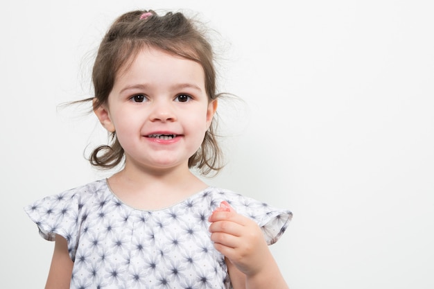 Child girl happy smile in white 