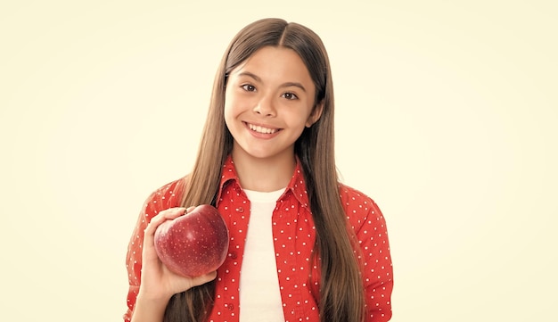 Child girl with apple Smiling teenage child girl