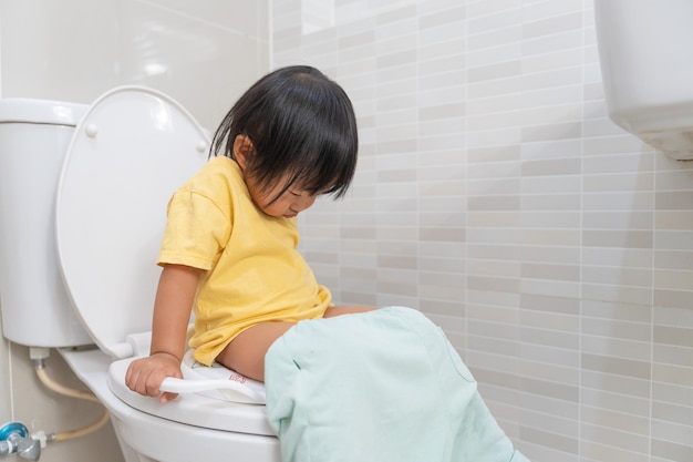 child going to the toilet constipation in children dyspepsia abdominal pain crying defecating straining urinary incontinence blood in the stool bowel problems ulcerative colitis diarrhea