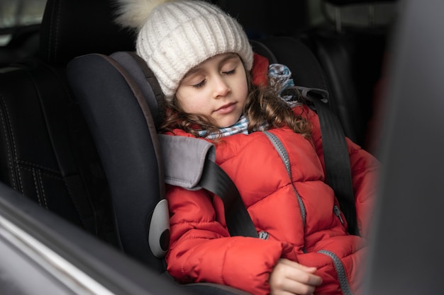 Child having fun during winter roadtrip