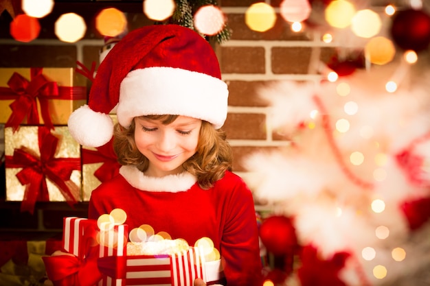 Child holding Christmas gift