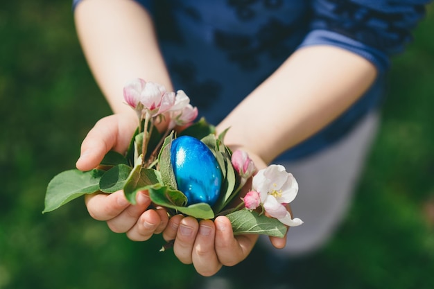 Child holding easter eggs hunting for easter eggs