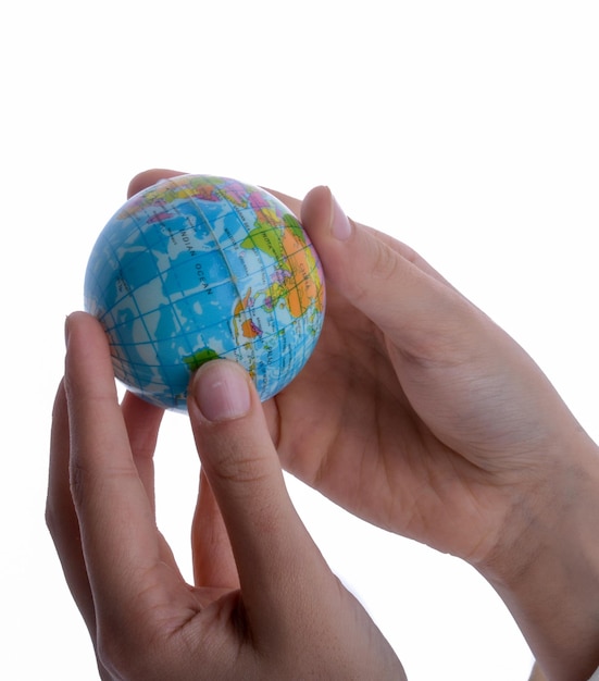 Child holding a globe