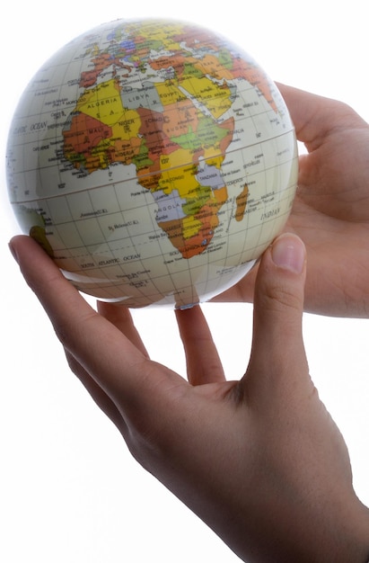 Child holding a globe