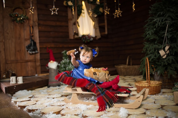 The child is exited and ready to celebrate Christmas