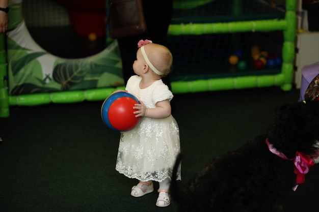 A child is having fun and playing at a children's party