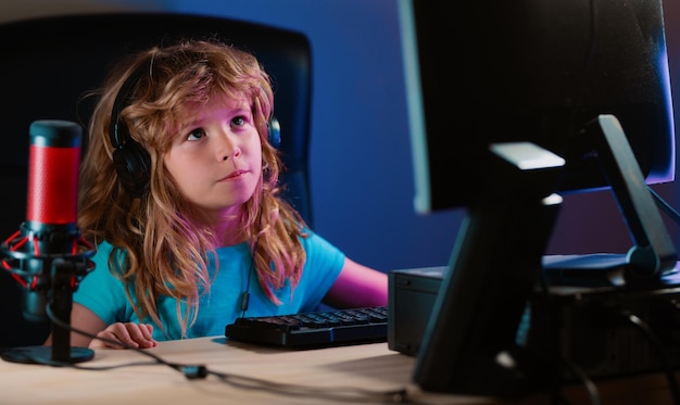 Child learning in virtual online school class Kid working on laptop Internet at home Child using laptop computer Homeschooling for children Little hacker young programmer