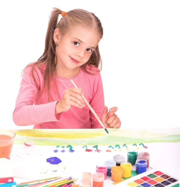 The child a little girl draws paints isolated on white background