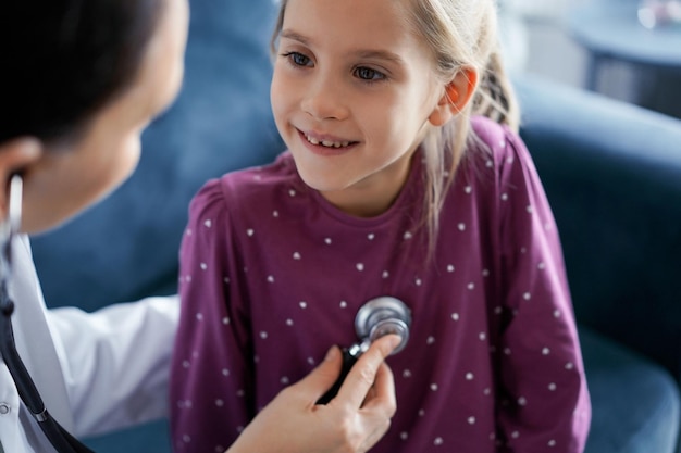 child patient at usual medical inspection doctor and kid patient at home medicine healthcare concepts