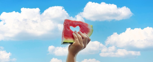 A child on a picnic eats a watermelon Selective focus