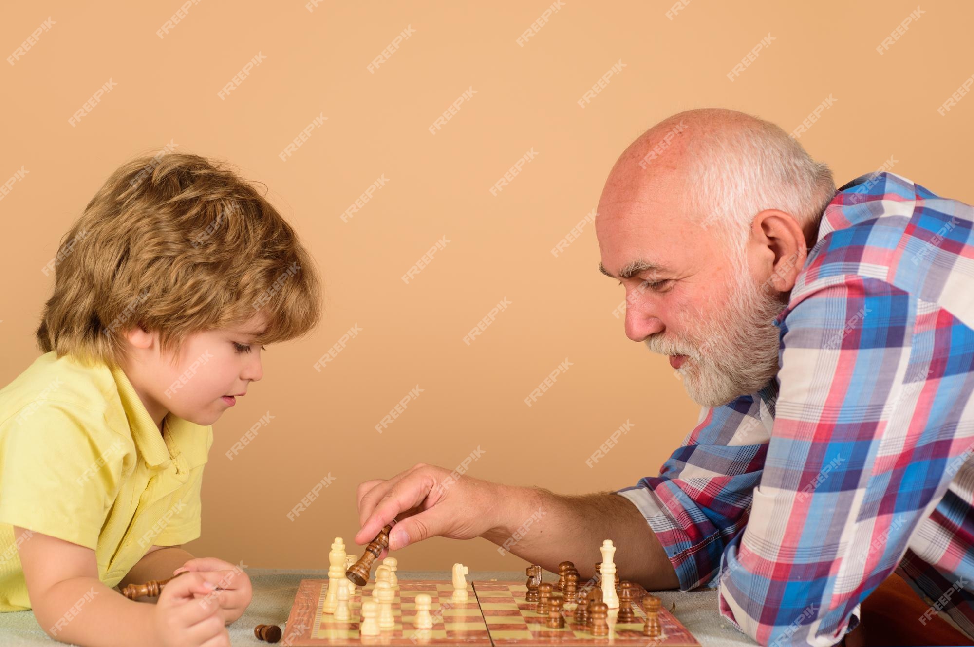 Senior man thinking about his next move in a game of chess Stock Photo by  dmytros9