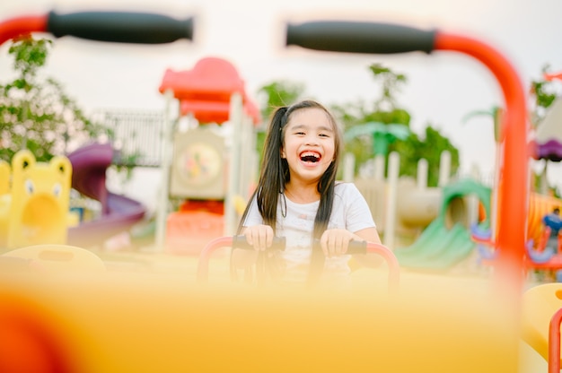 Child Playing having fun on playground