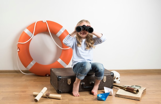 child playing a journey on the floor