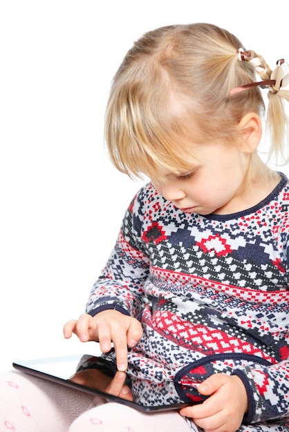 Child playing with a tablet computer