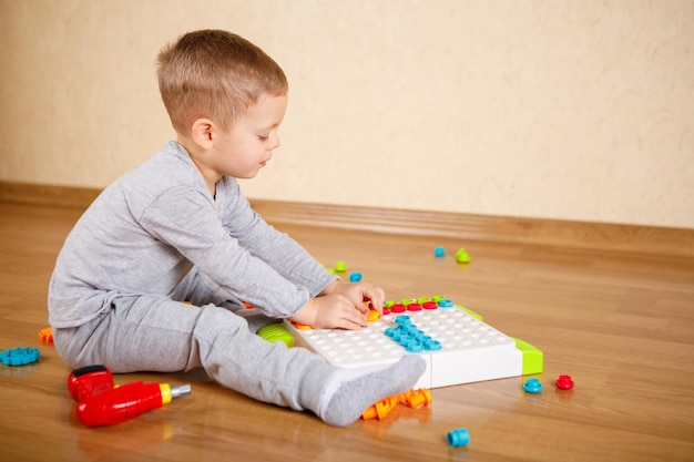 Child plays with a childrens designer