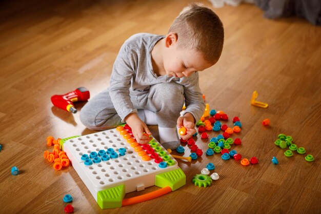 Child plays with a childrens designer