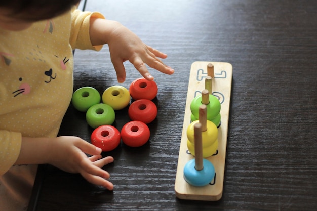 A child plays with a toy that says'i'm a teacher '