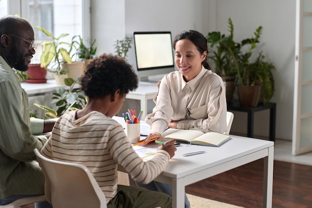 Child psychologist in consultation with family