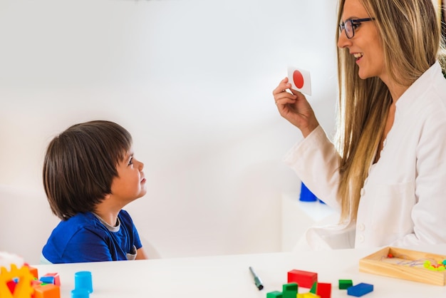 Child psychology toddler doing logic tests with cards