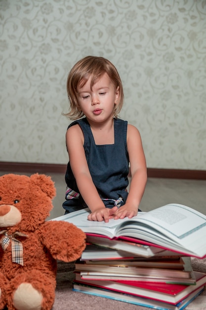 Child reads story for toy