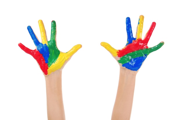 Le mani del bambino in vernice su sfondo bianco