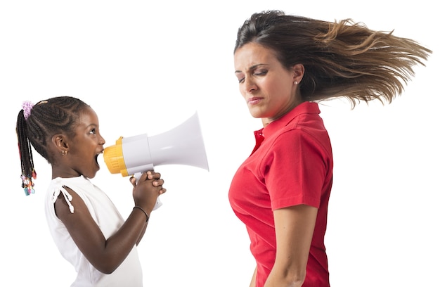 Child screaming with megaphone to an adult