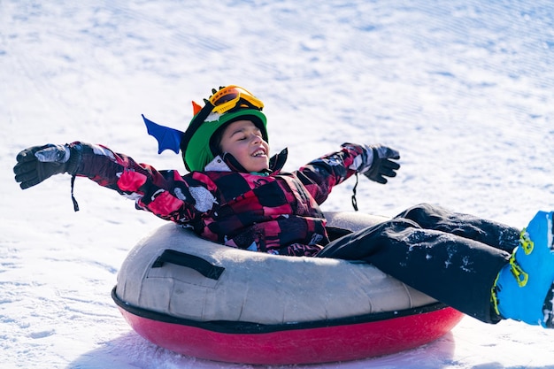 Child in Snow Tube