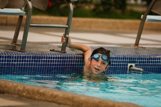 Child in swimming lessons in the daytime