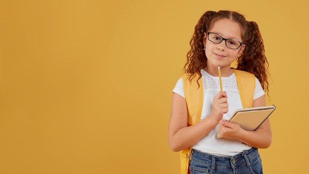 Child Thinking And Holding Notebook Copy Space