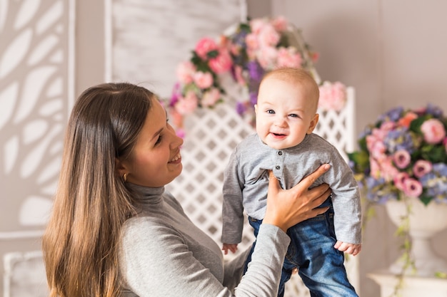 Child and toddler concept - curious cute baby looking to camera.