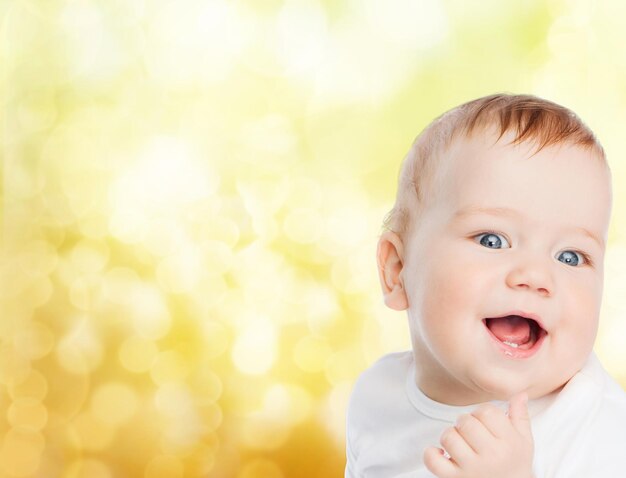 Photo child and toddler concept - smiling little baby