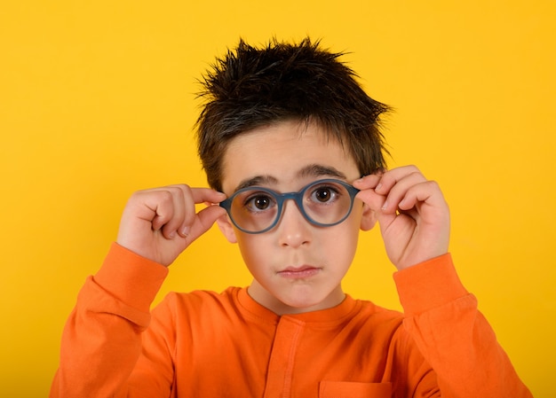 Child tries new glasses to see better on yellow