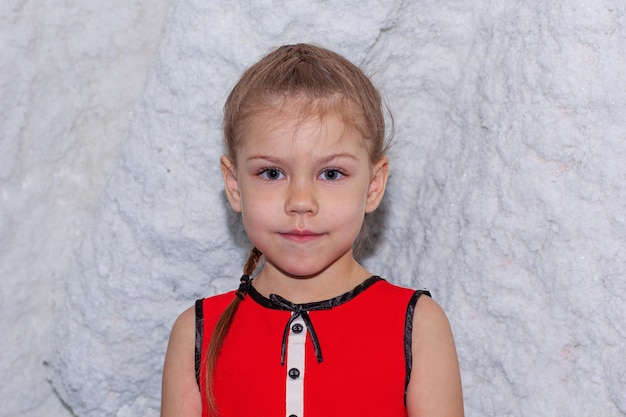 Child over wall of salt cave