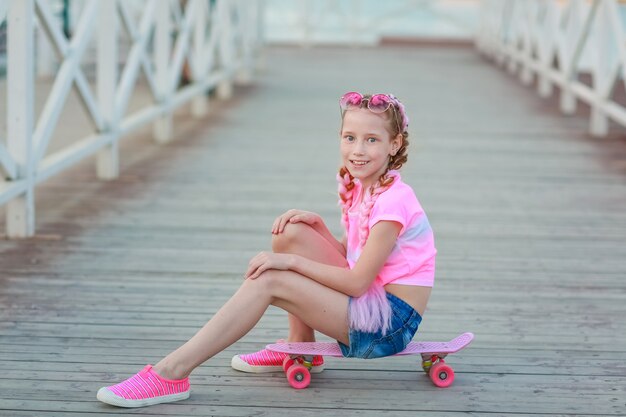 The child was tired of active outdoor games and sat down to rest