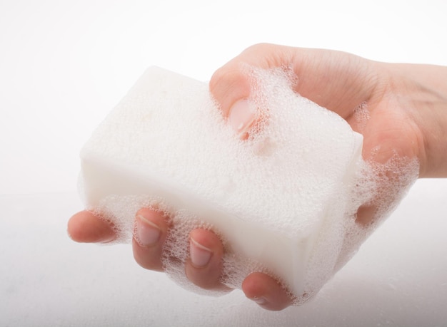 Child washing hands with soap