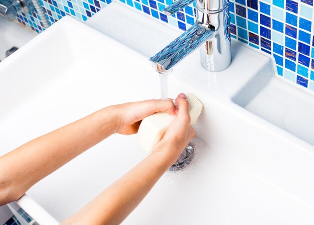 Child washing hands