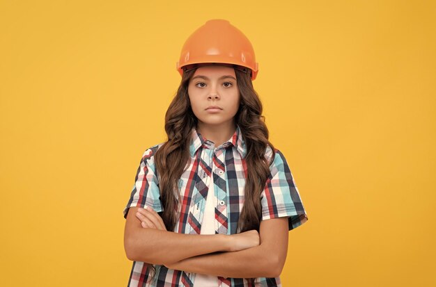 Child wear helmet for building protection and safety kid education on construction site