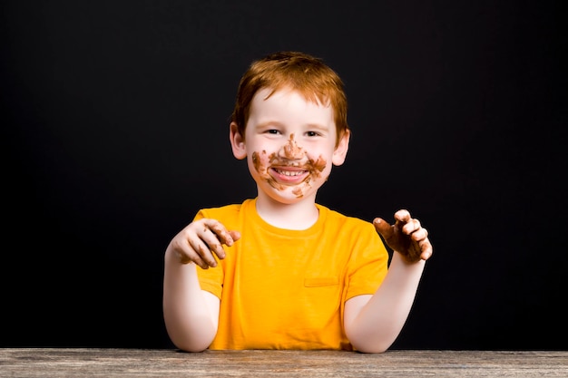 The child in whose hands melted chocolate