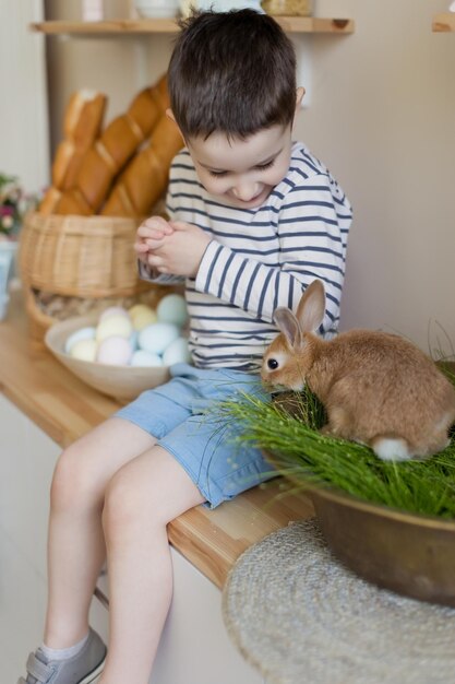 Photo child with bunny and easter decor