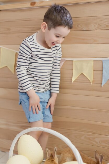 Photo child with bunny and easter decor